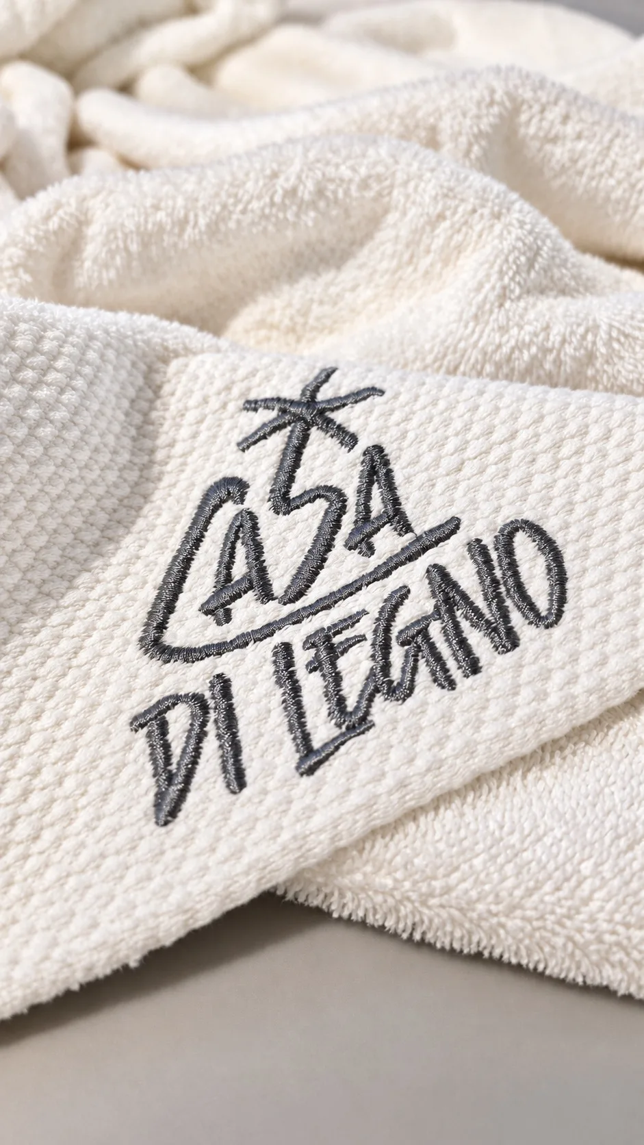 Casa di Legno name embroidered on a towel — Standard villa, Casa di Legno Resort
